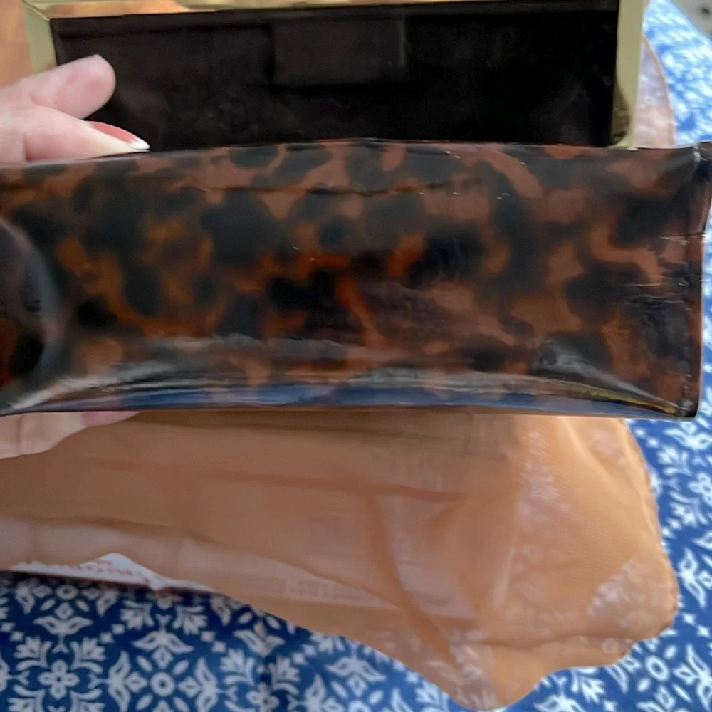 Authentic Tory Burch glass case. Animal print. Magnetic closure. Gold trim . EUC - Picture 7 of 7